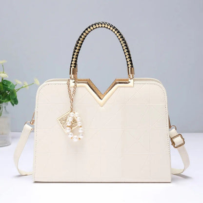 Calenvi Elegant Handbag with Gold Accents